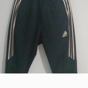 Black & Gold Adidas Tiro soccer pants.